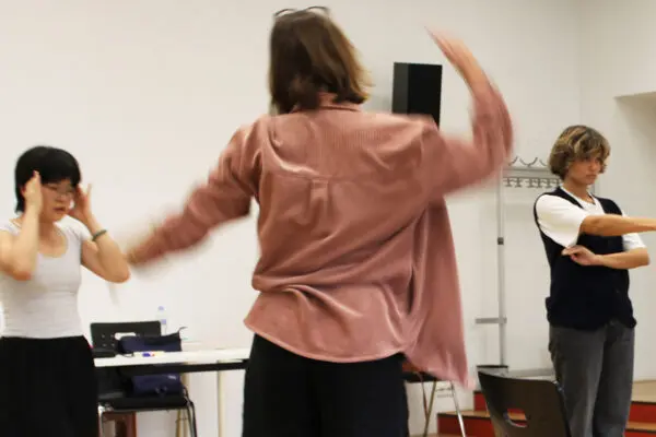 Three people in movement