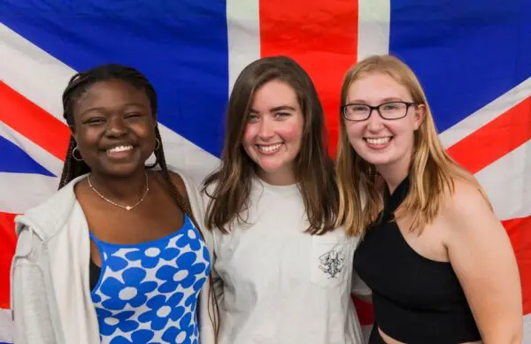 3 Westminster Summer School students in front of the Union Jack